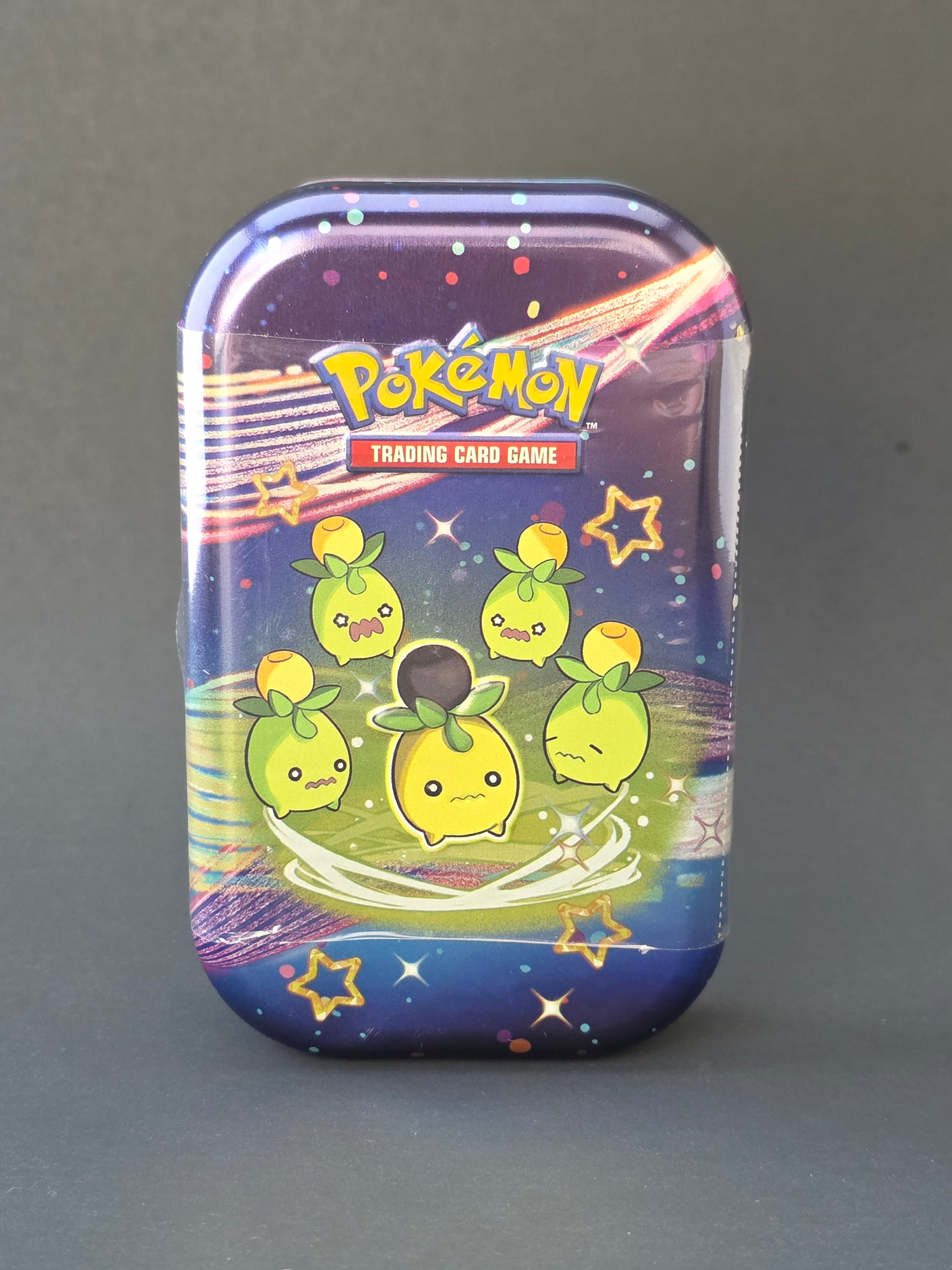 Paldean Fates Mini Tin featuring Smoliv
